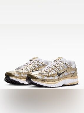 Nike Women’s Gold and White Mesh Running Sneakers